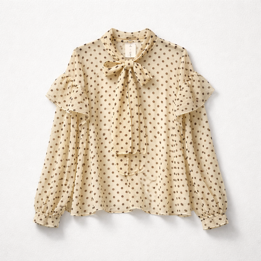 Blouse transparente à pois