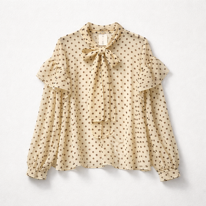 Blouse transparente à pois